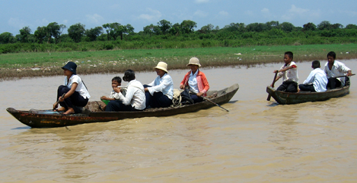 Children returning from school in sampans