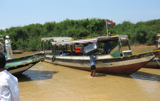 Luggage being offloaded from a lighter