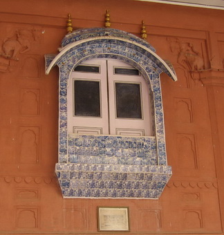 Window decorated with Delft tiles.